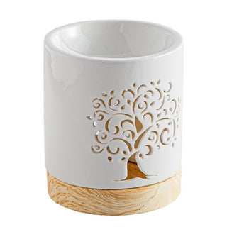 Le brûle-parfum LIFE TREE représente un symbole emblématique de spiritualité : l'arbre de vie. Ses ouvertures laissent échapper la douce lueur de la bougie créant ainsi une ambiance agérable et divinement parfumée.