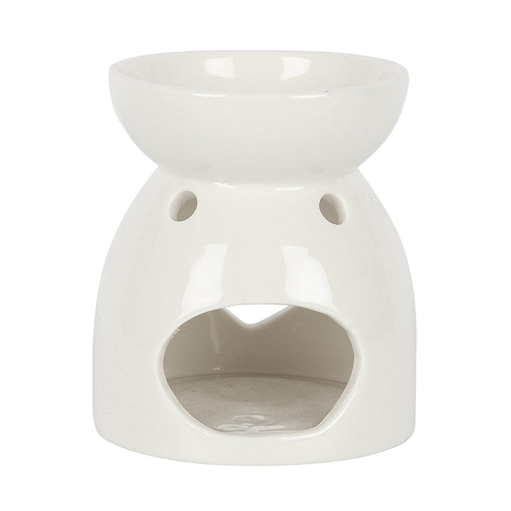 Ce brûleur blanc avec son motif découpé en forme de coeur, aura fière allure dans n'importe quel intérieur!
