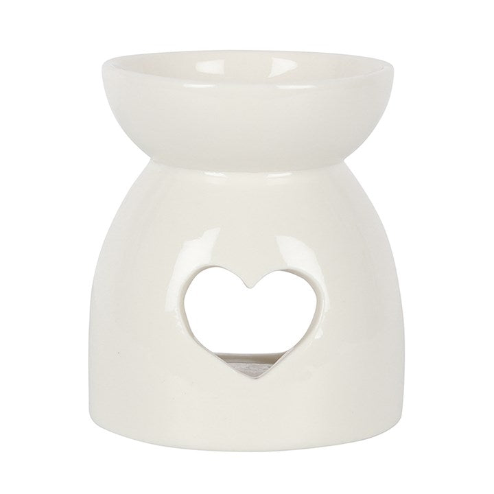 Ce brûleur blanc avec son motif découpé en forme de coeur, aura fière allure dans n'importe quel intérieur!